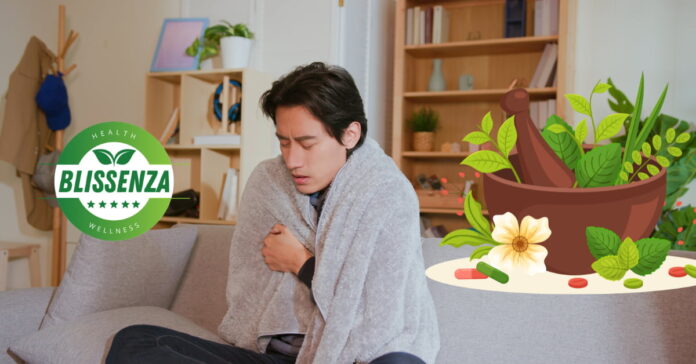 Hombre tapandose porque siente escalofrios debido a la gripe